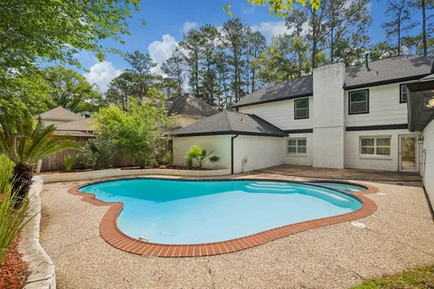 a view of outdoor space yard swimming pool and porch