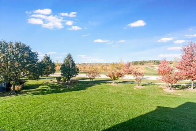 a view of a lake with a big yard