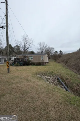 a view of a terrace with yard