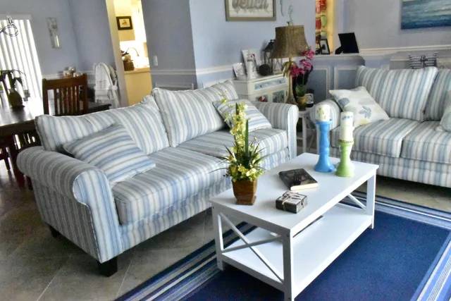 a living room with furniture and a couch