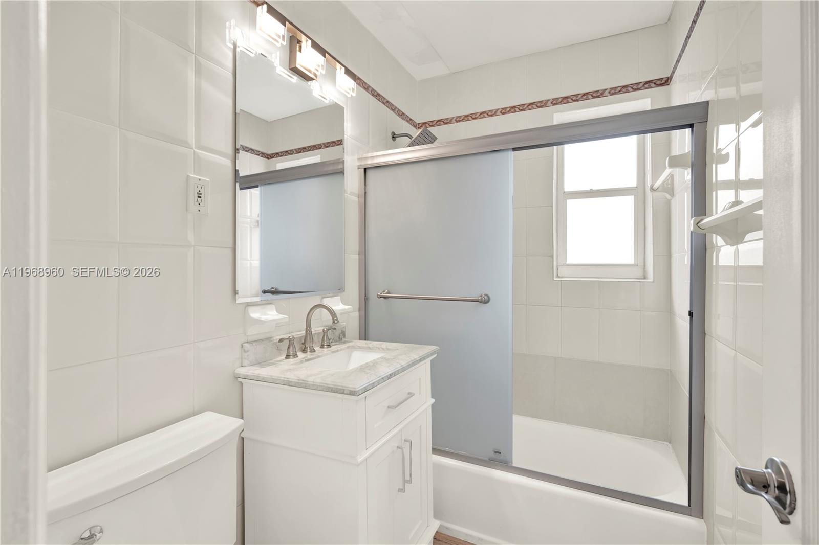 2001 Southwest 37th Avenue Miami, FL 33145 - Photo 24 of 31 a bathroom with a sink toilet and shower