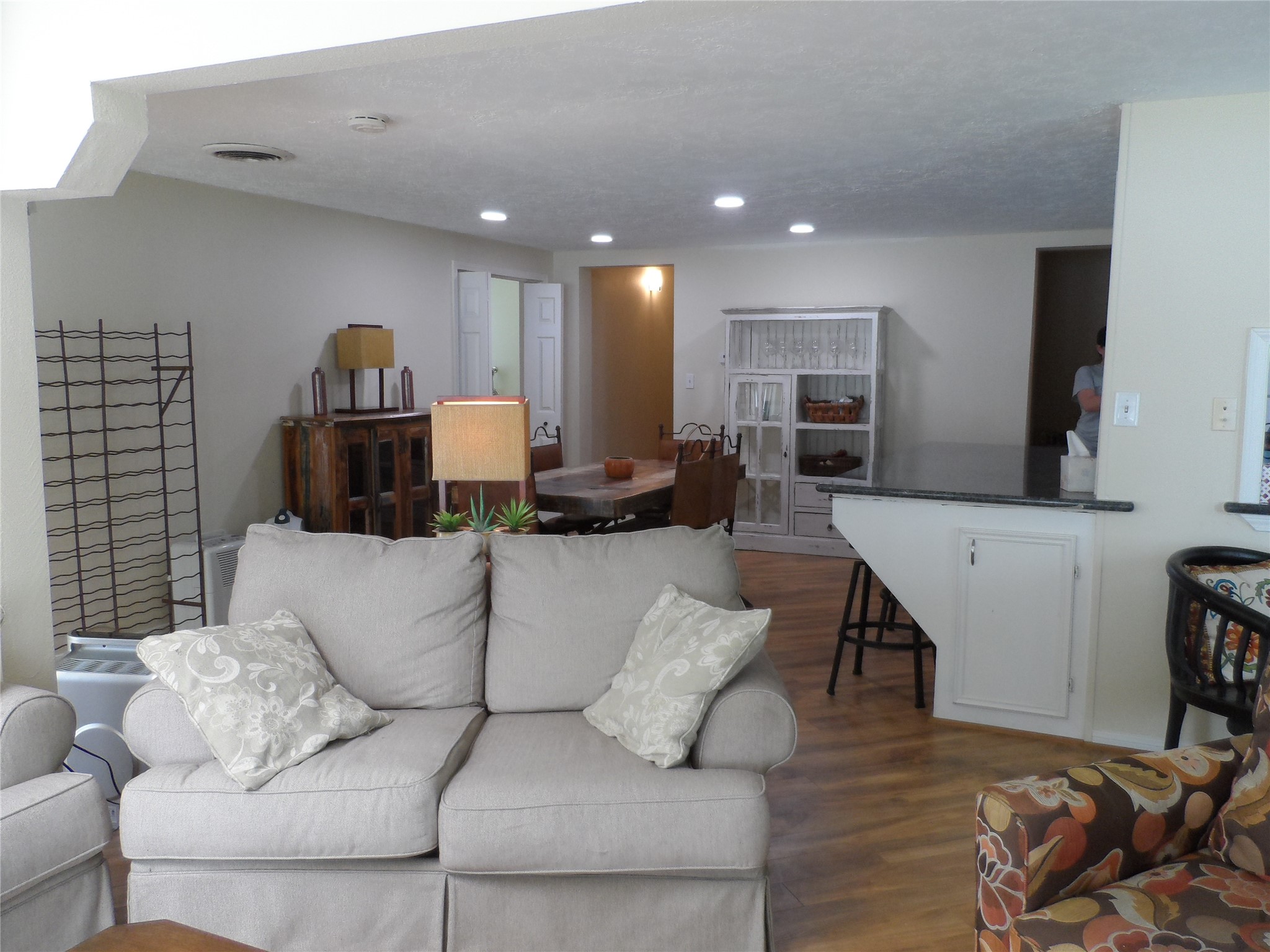13545 Northshore Loop Conroe, TX 77304 - Photo 20 of 44 a living room with furniture and a wooden floor