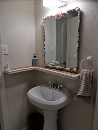 a bathroom with a sink and a toilet