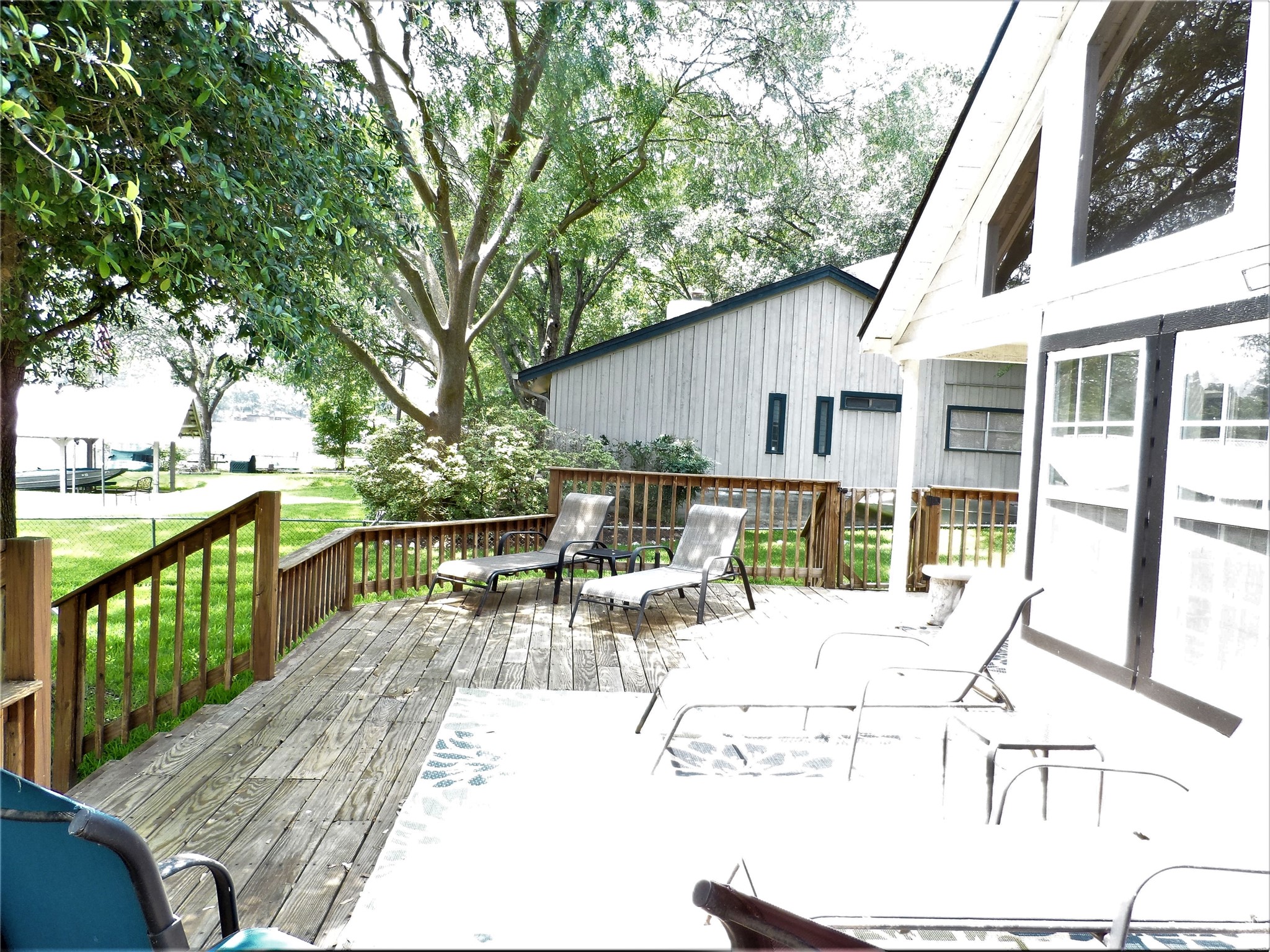 13545 Northshore Loop Conroe, TX 77304 - Photo 43 of 44 a view of a house with backyard and sitting area