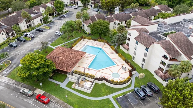 an aerial view of a house with outdoor space