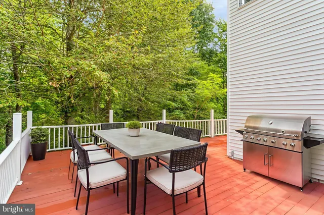 a patio with table and chairs