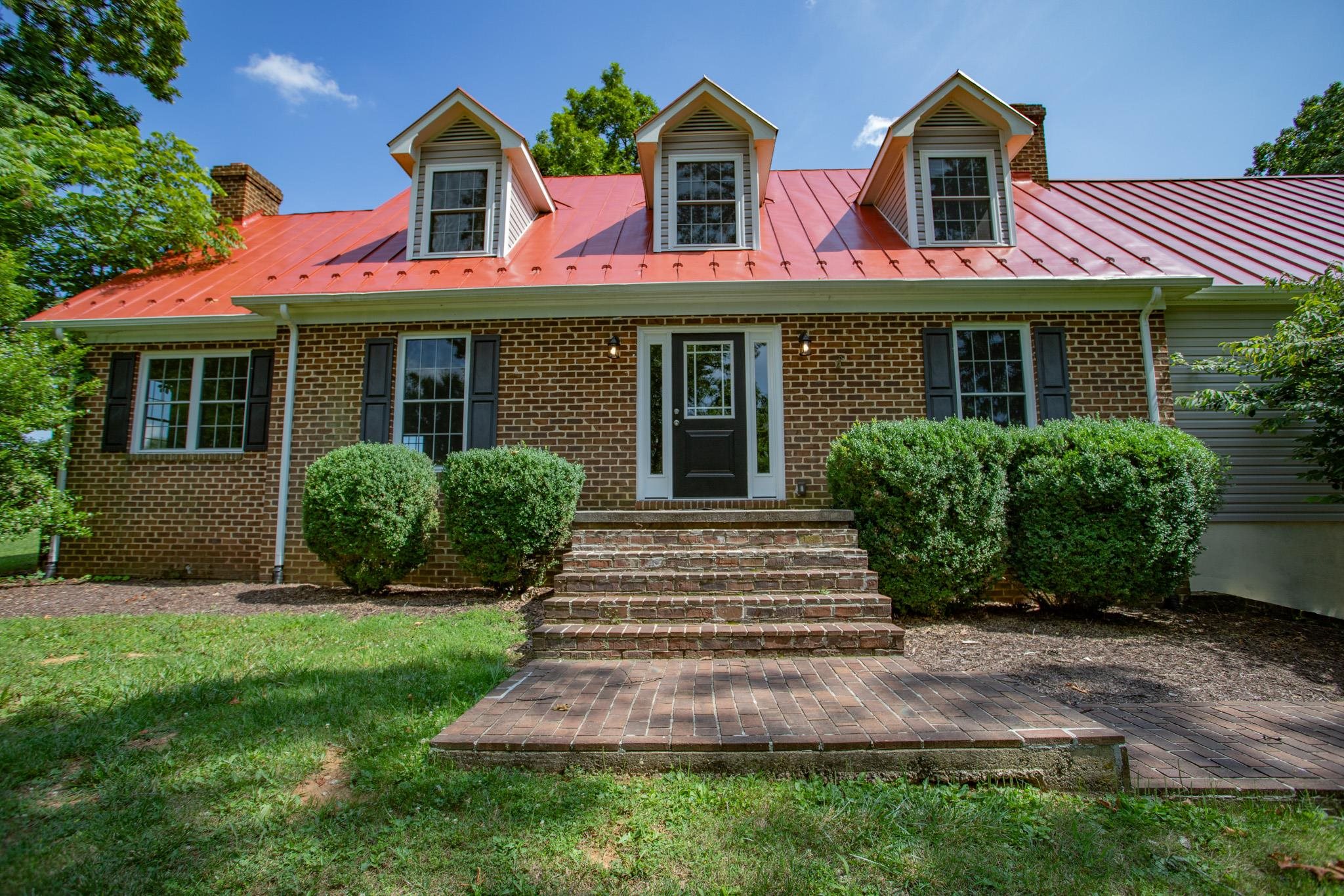 776 Chestnut Ridge Road Staunton, VA 24401 - Photo 1 of 73 a front view of a house with garden