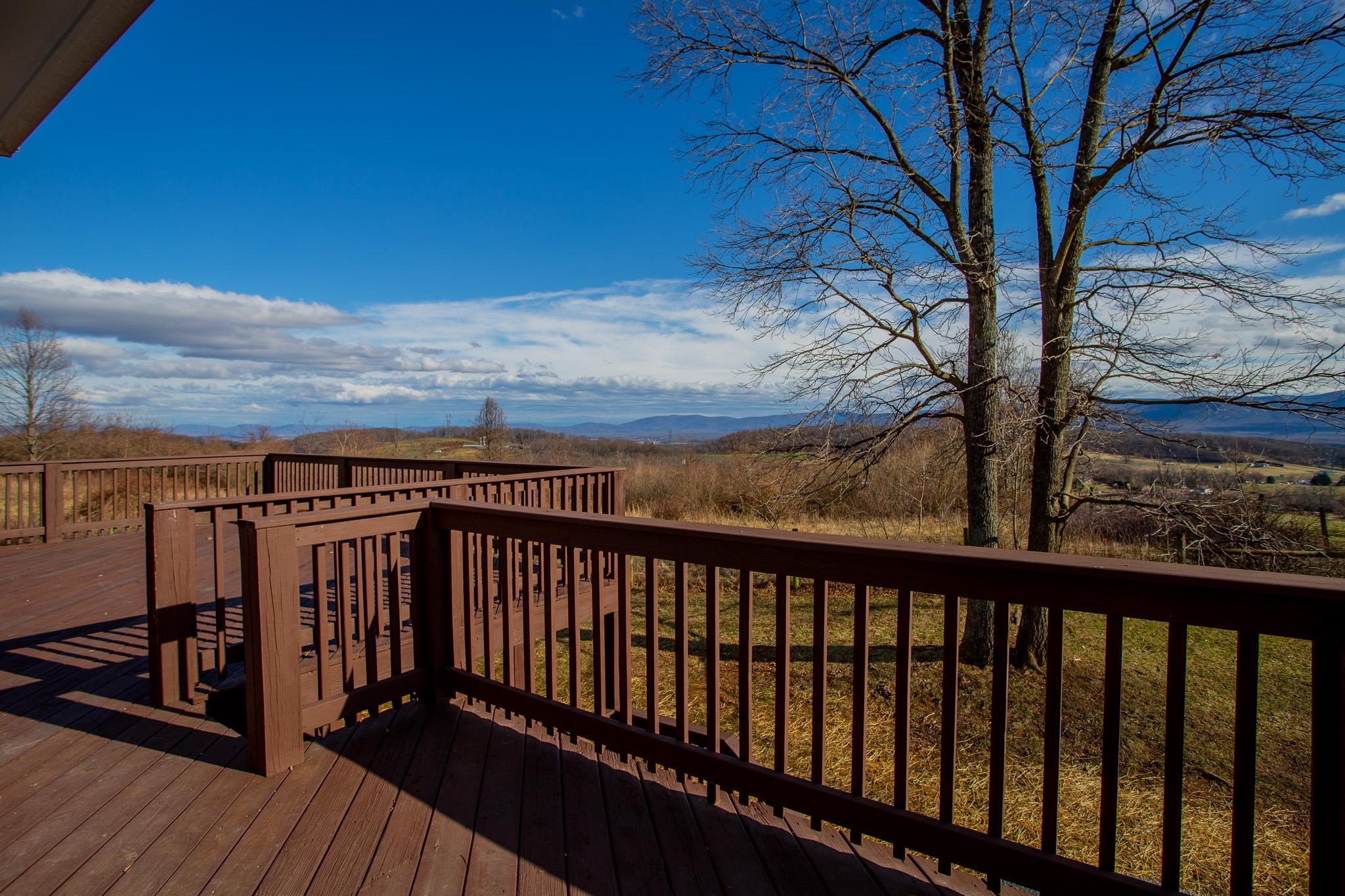 776 Chestnut Ridge Road Staunton, VA 24401 - Photo 14 of 73 a view of balcony with wooden floor and fence