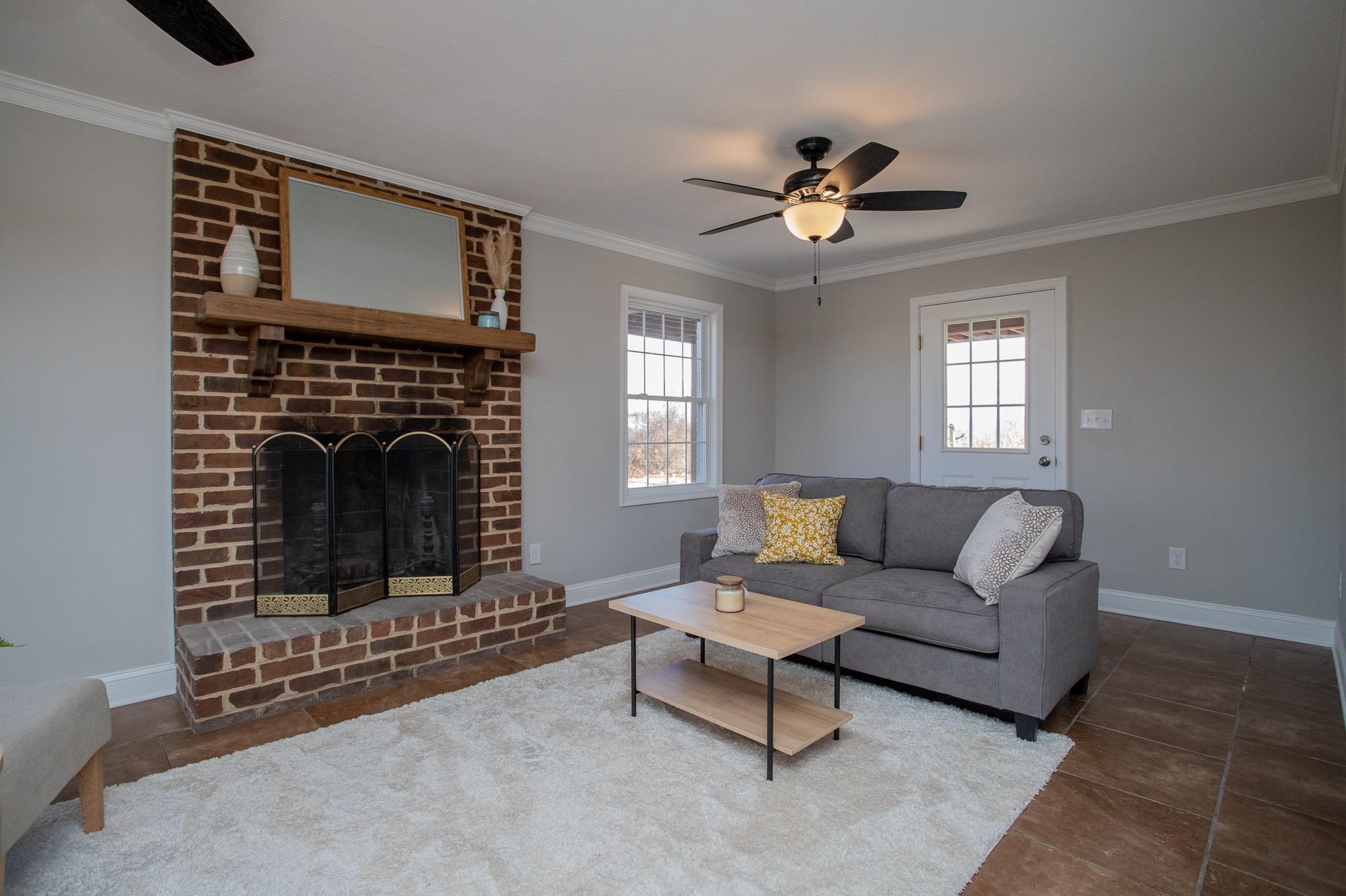 776 Chestnut Ridge Road Staunton, VA 24401 - Photo 16 of 73 a living room with furniture and a fireplace
