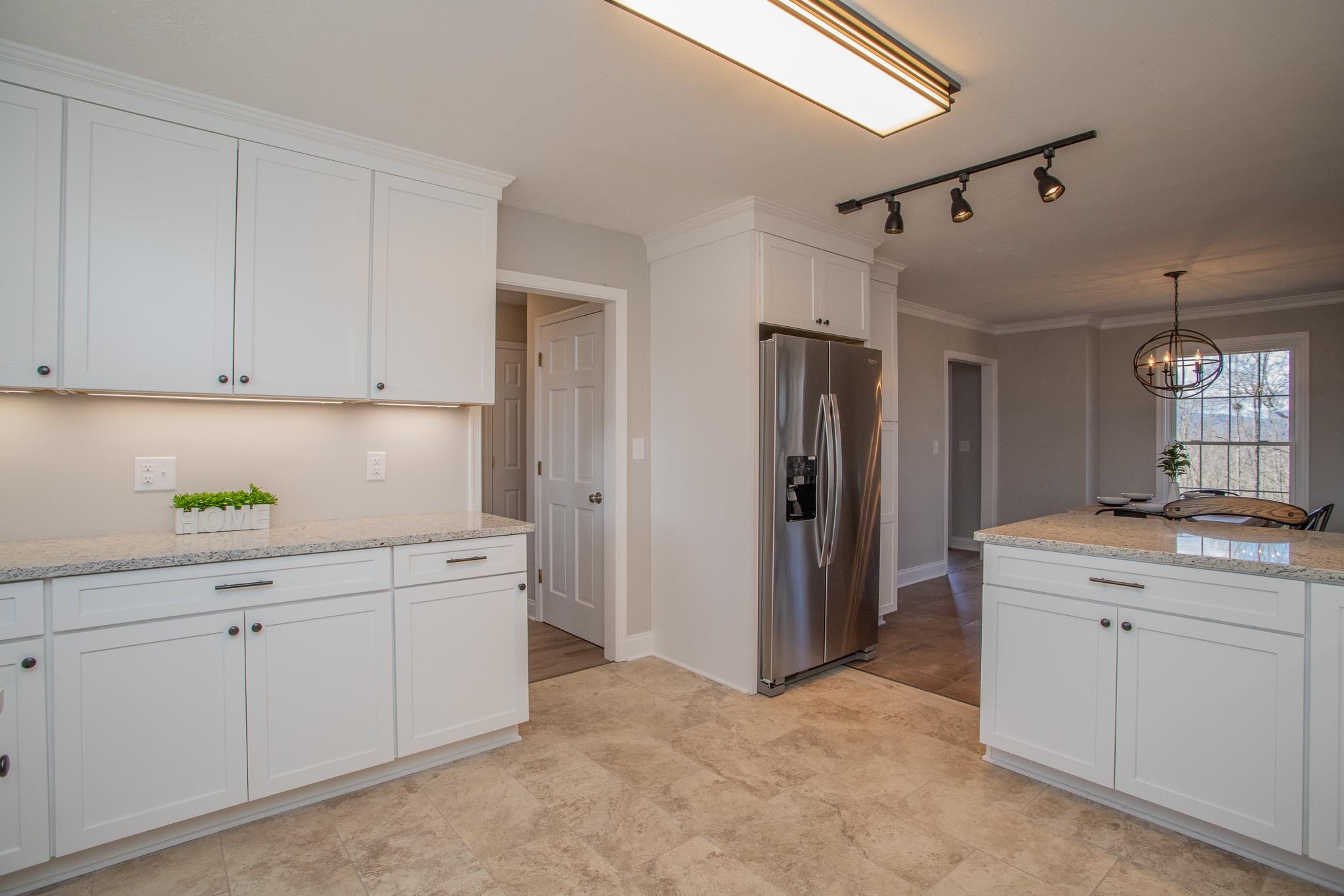 776 Chestnut Ridge Road Staunton, VA 24401 - Photo 26 of 73 a kitchen with a sink and cabinets