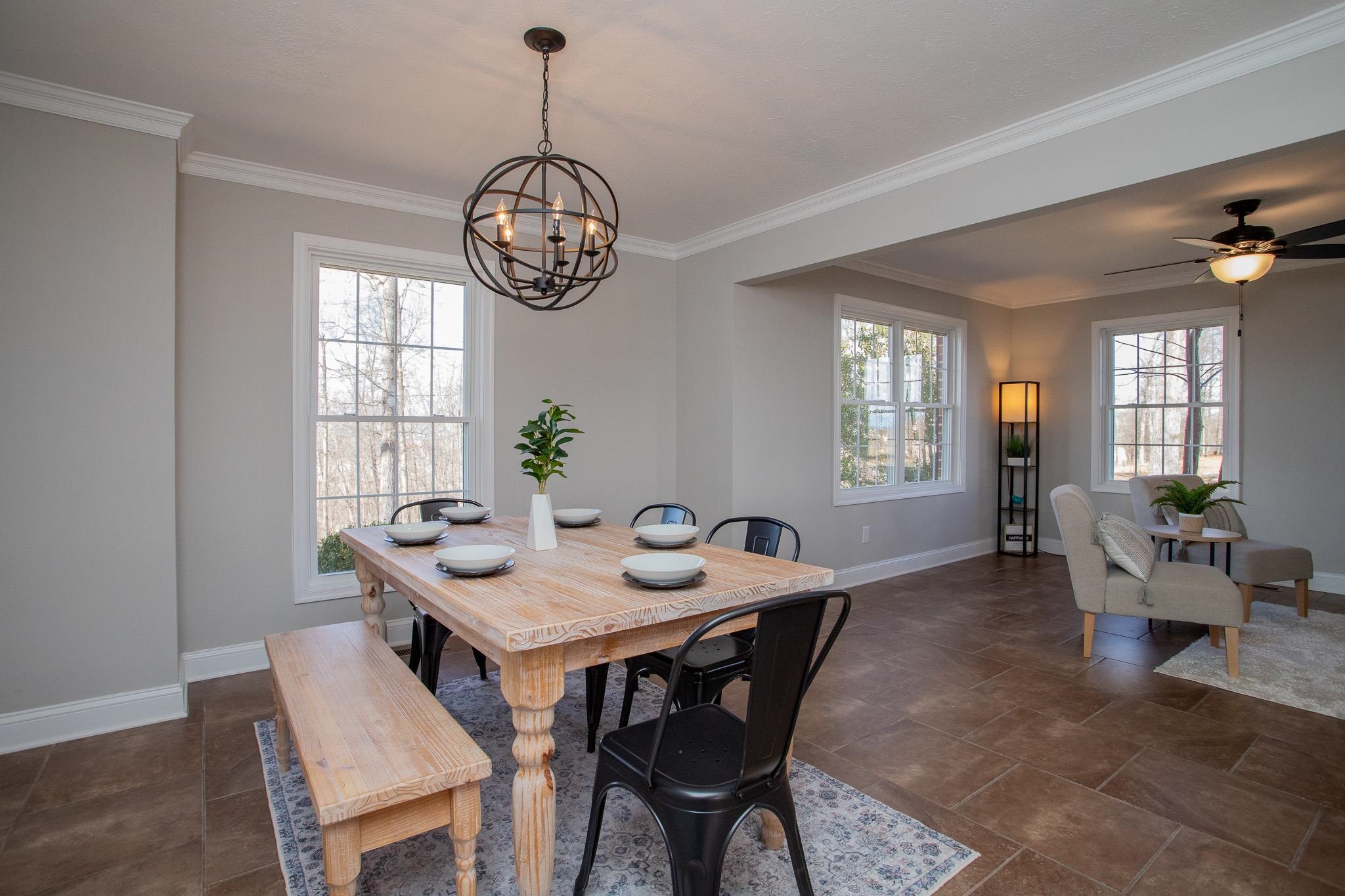 776 Chestnut Ridge Road Staunton, VA 24401 - Photo 32 of 73 a view of a dining room with furniture window and wooden floor