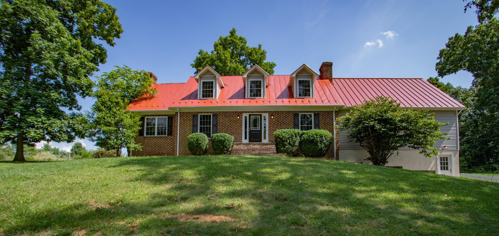 776 Chestnut Ridge Road Staunton, VA 24401 - Photo 4 of 73 a front view of a house with a yard