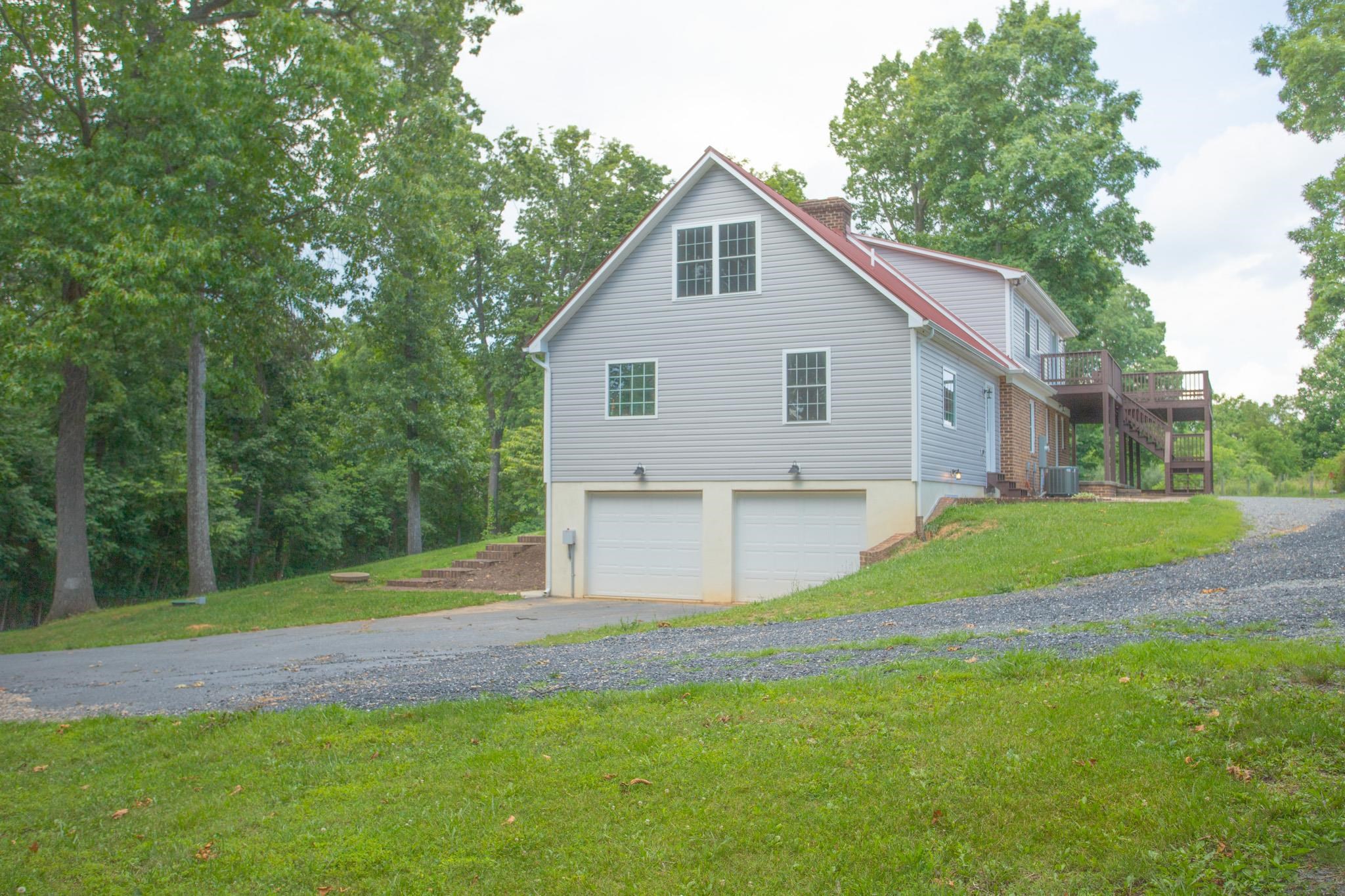 776 Chestnut Ridge Road Staunton, VA 24401 - Photo 6 of 73 a view of a house with backyard and trees
