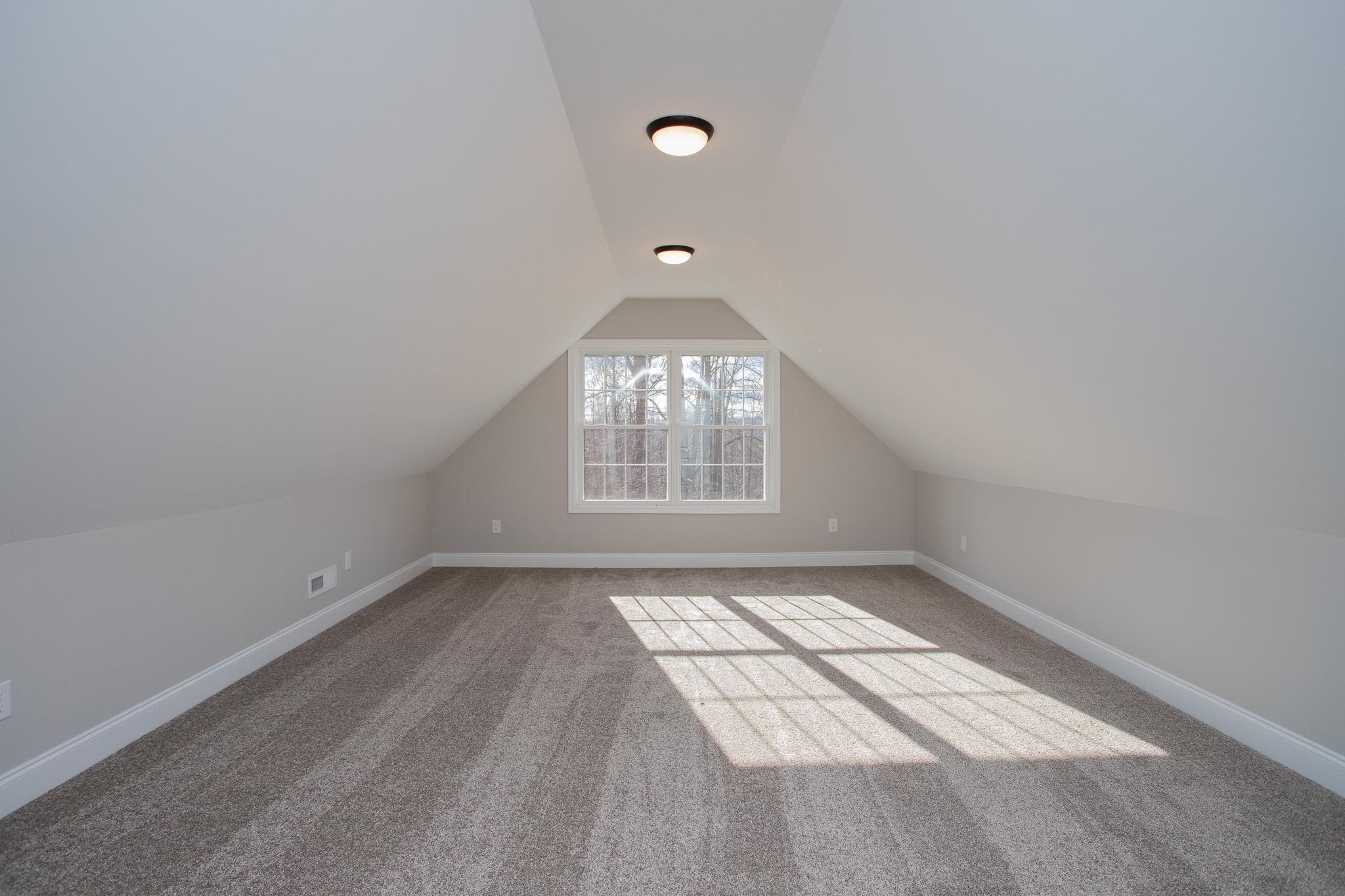 776 Chestnut Ridge Road Staunton, VA 24401 - Photo 65 of 73 an empty room with windows and chandelier fan