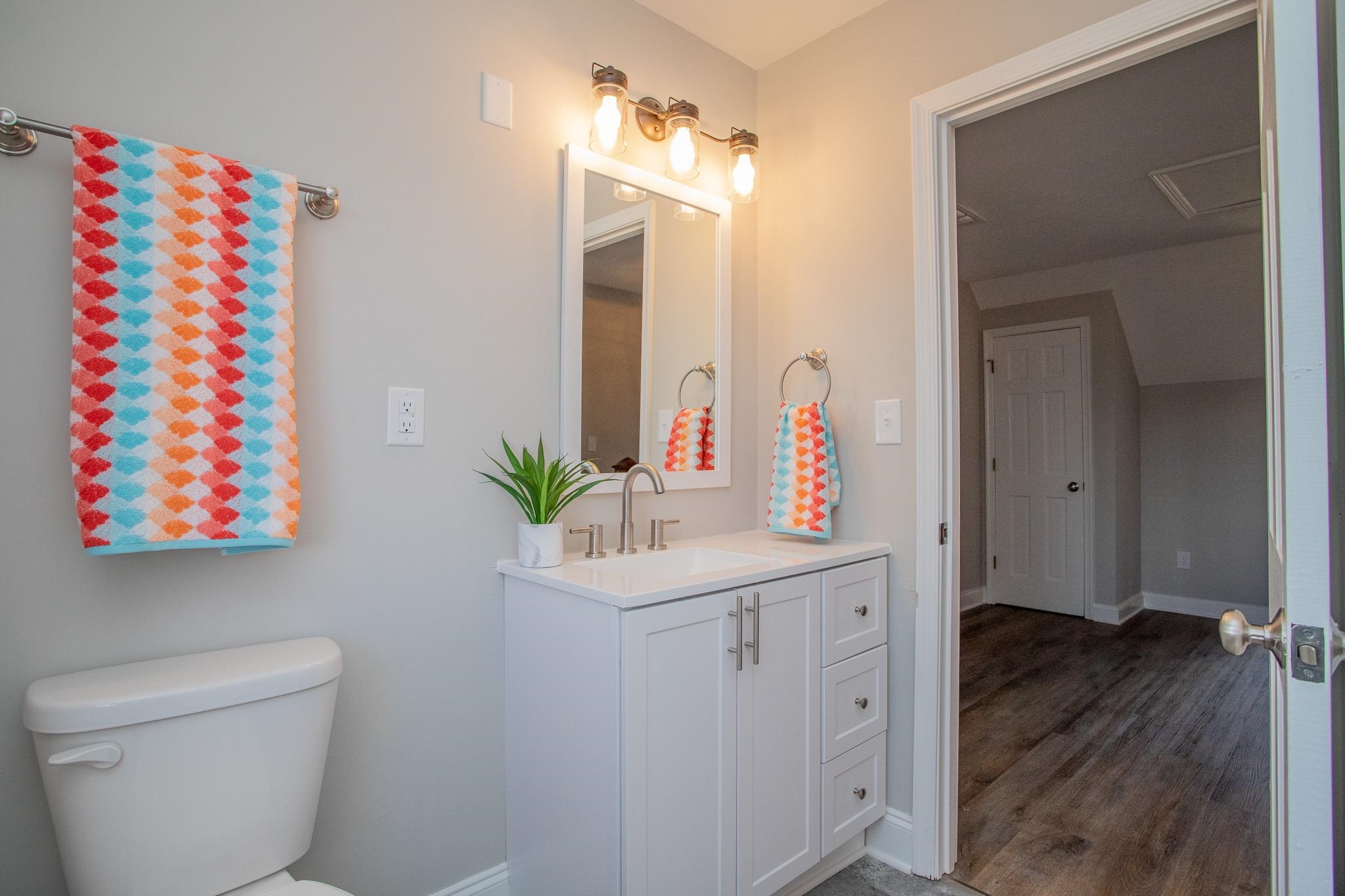 776 Chestnut Ridge Road Staunton, VA 24401 - Photo 68 of 73 a bathroom with a sink a toilet and a mirror