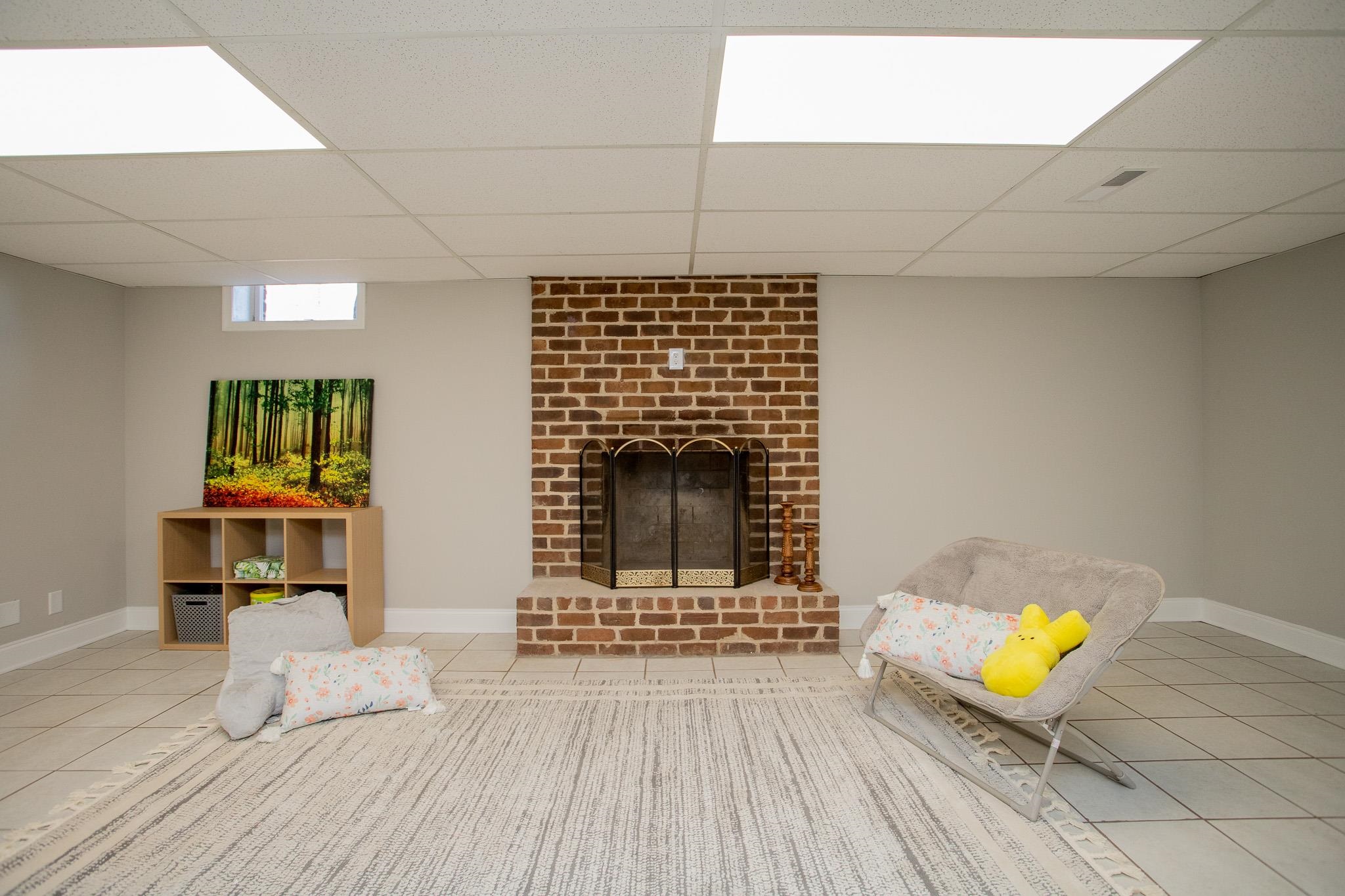 776 Chestnut Ridge Road Staunton, VA 24401 - Photo 69 of 73 a living room with furniture and a fireplace