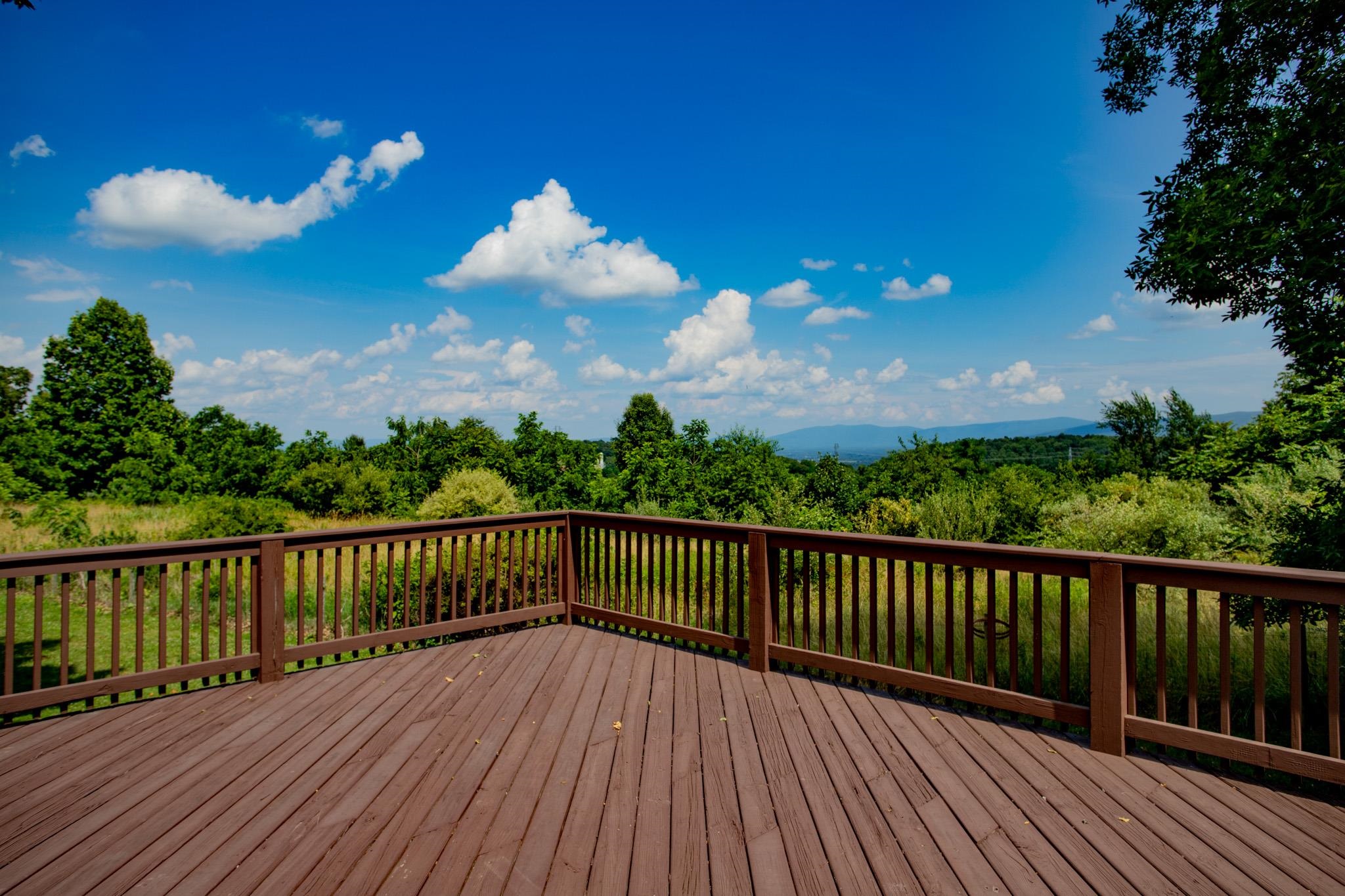 776 Chestnut Ridge Road Staunton, VA 24401 - Photo 8 of 73 a view of a balcony with wooden floor