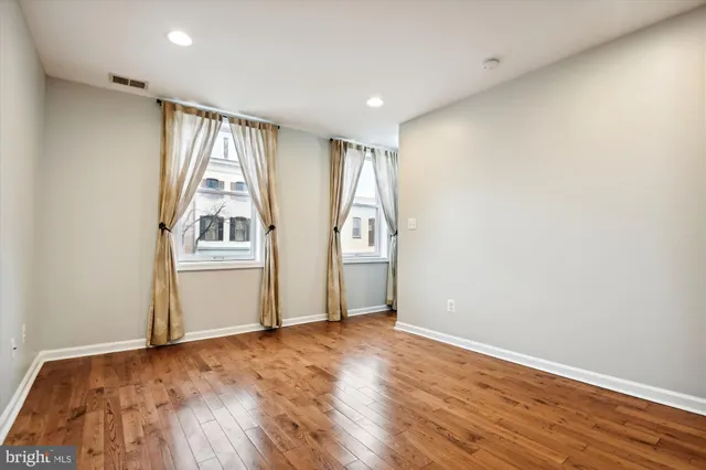 a view of a kitchen with a sink