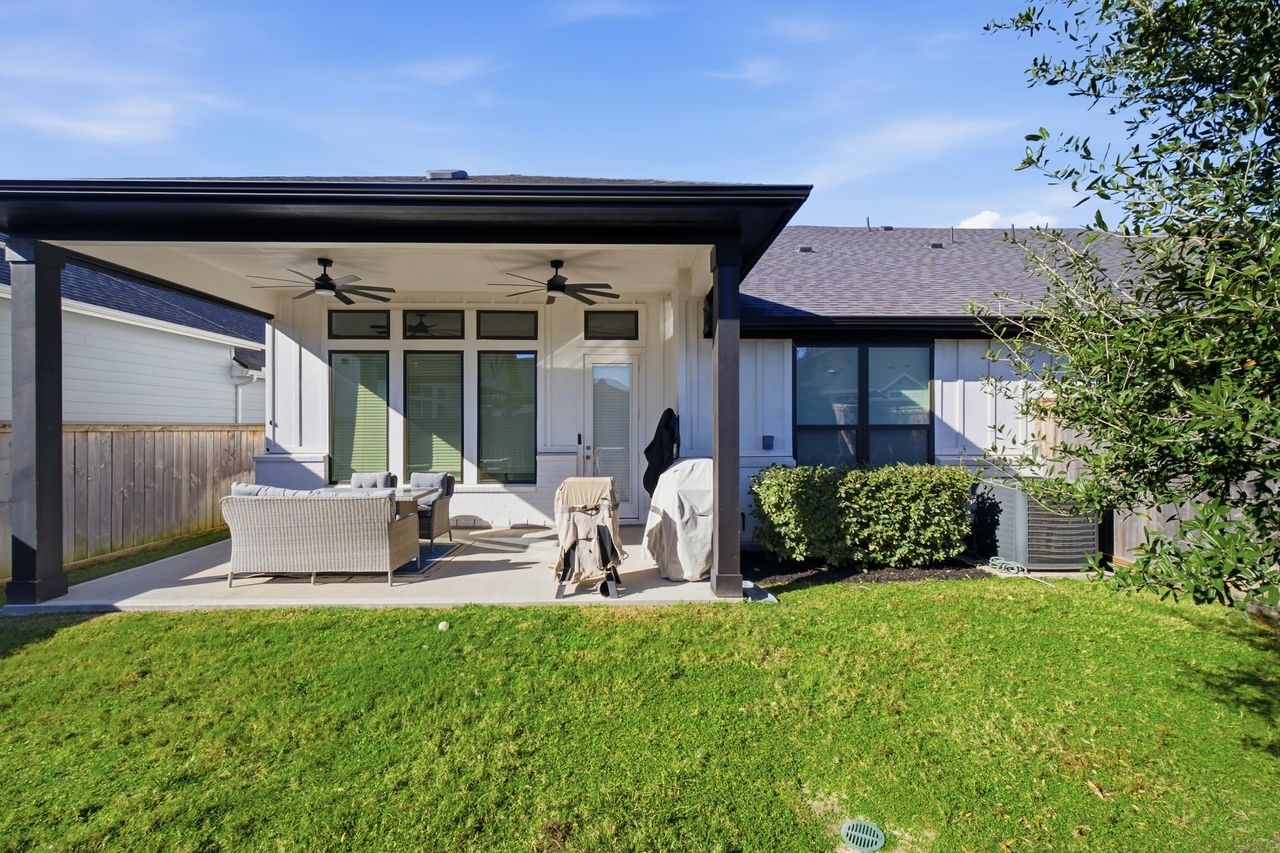 15326 Leal Rancho Court Cypress, TX 77433 - Photo 31 of 31 a front view of a house with garden