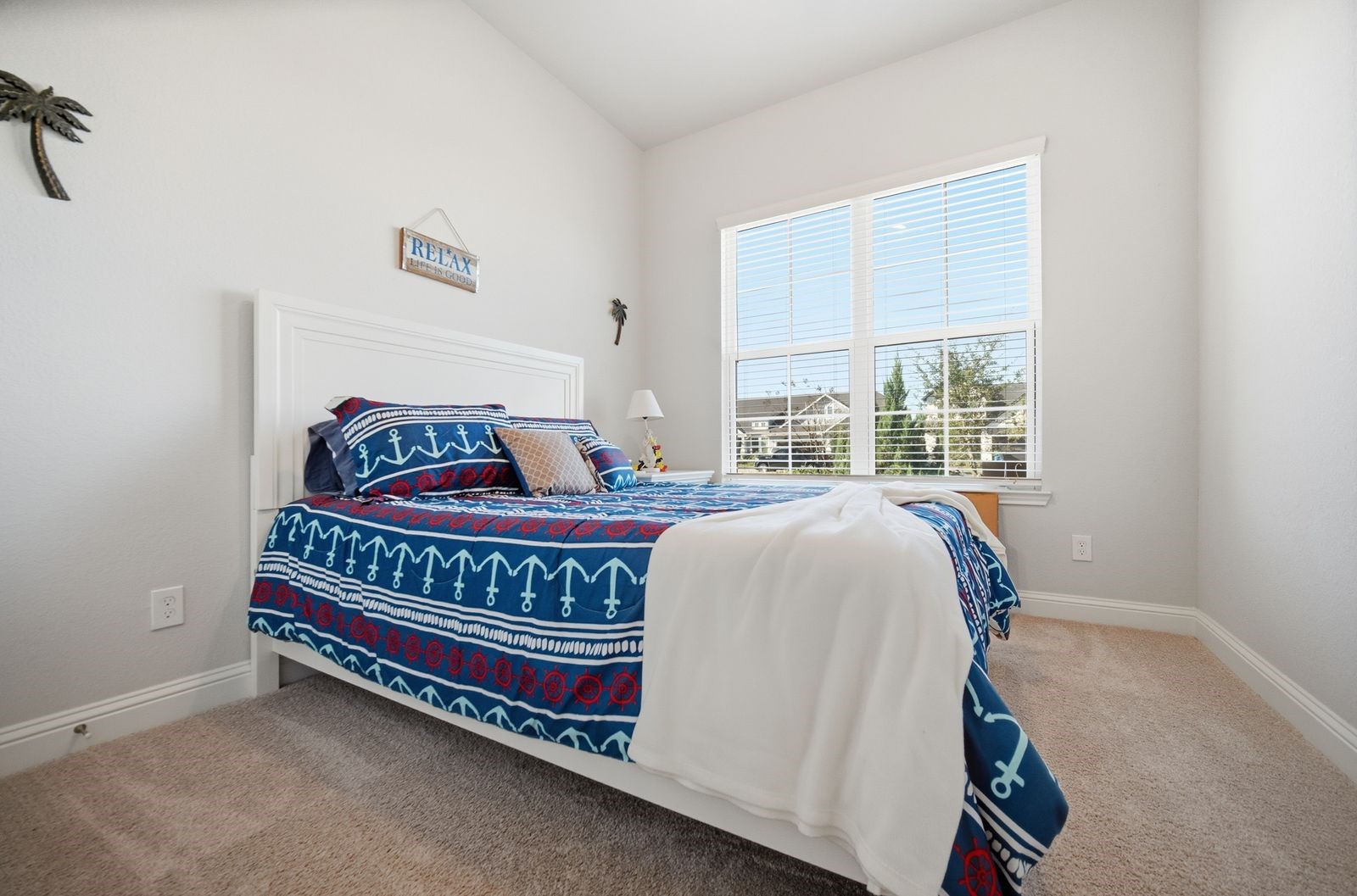 15326 Leal Rancho Court Cypress, TX 77433 - Photo 6 of 31 a bedroom with a bed and a window