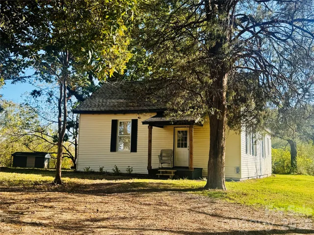 a front view of house with yard
