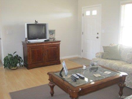 612 Sarah Lane Milan, MI 48160 - Photo 6 of 19 Living Room view 2.jpg