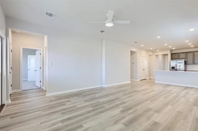 a view of a livingroom with wooden floor