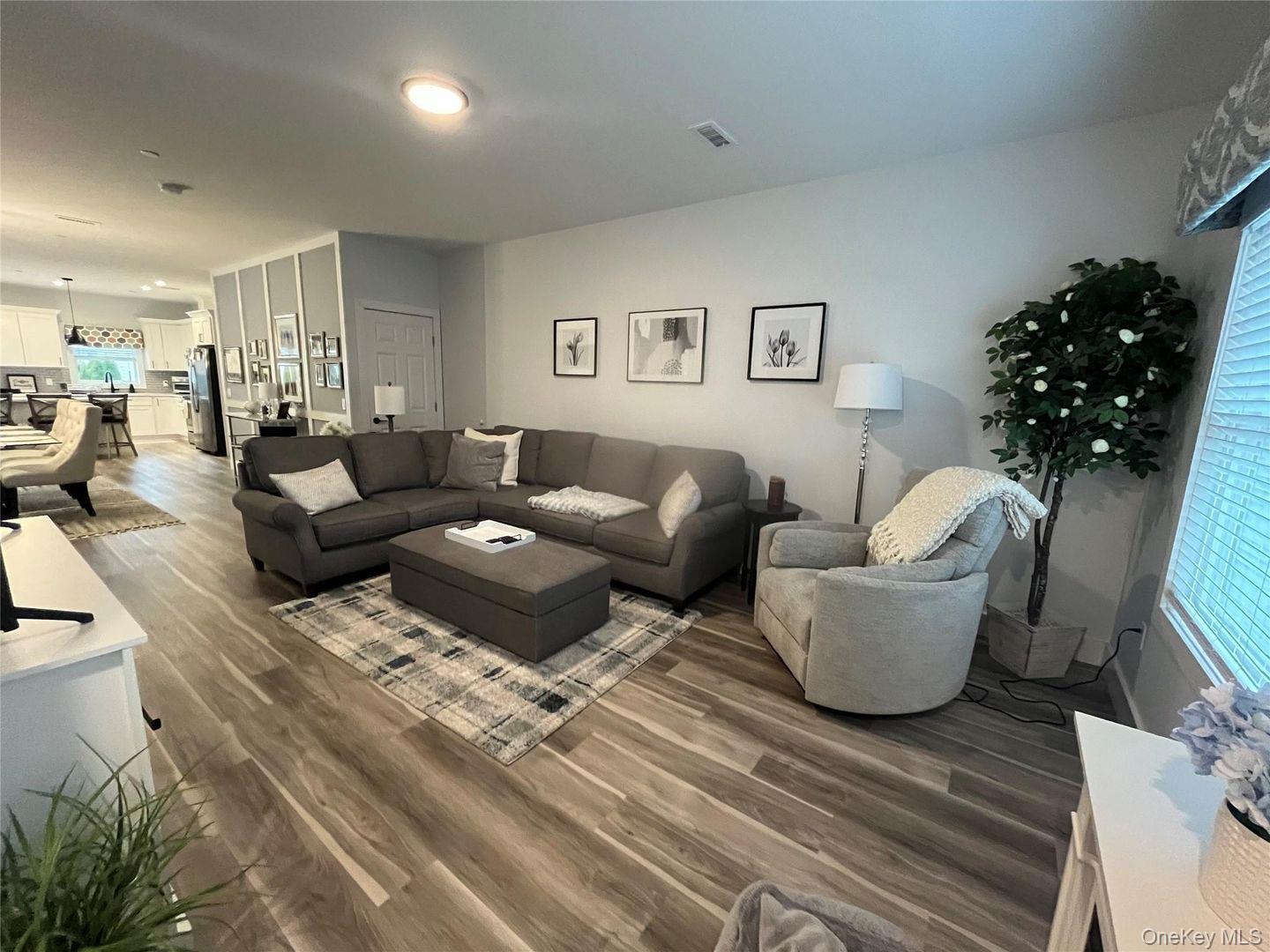 195 Park Avenue, Unit C West Harrison, NY 10604 - Photo 8 of 32 Living area featuring wood finished floors