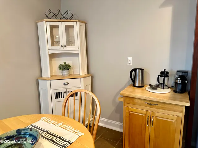 a bathroom with a sink a mirror and a toilet