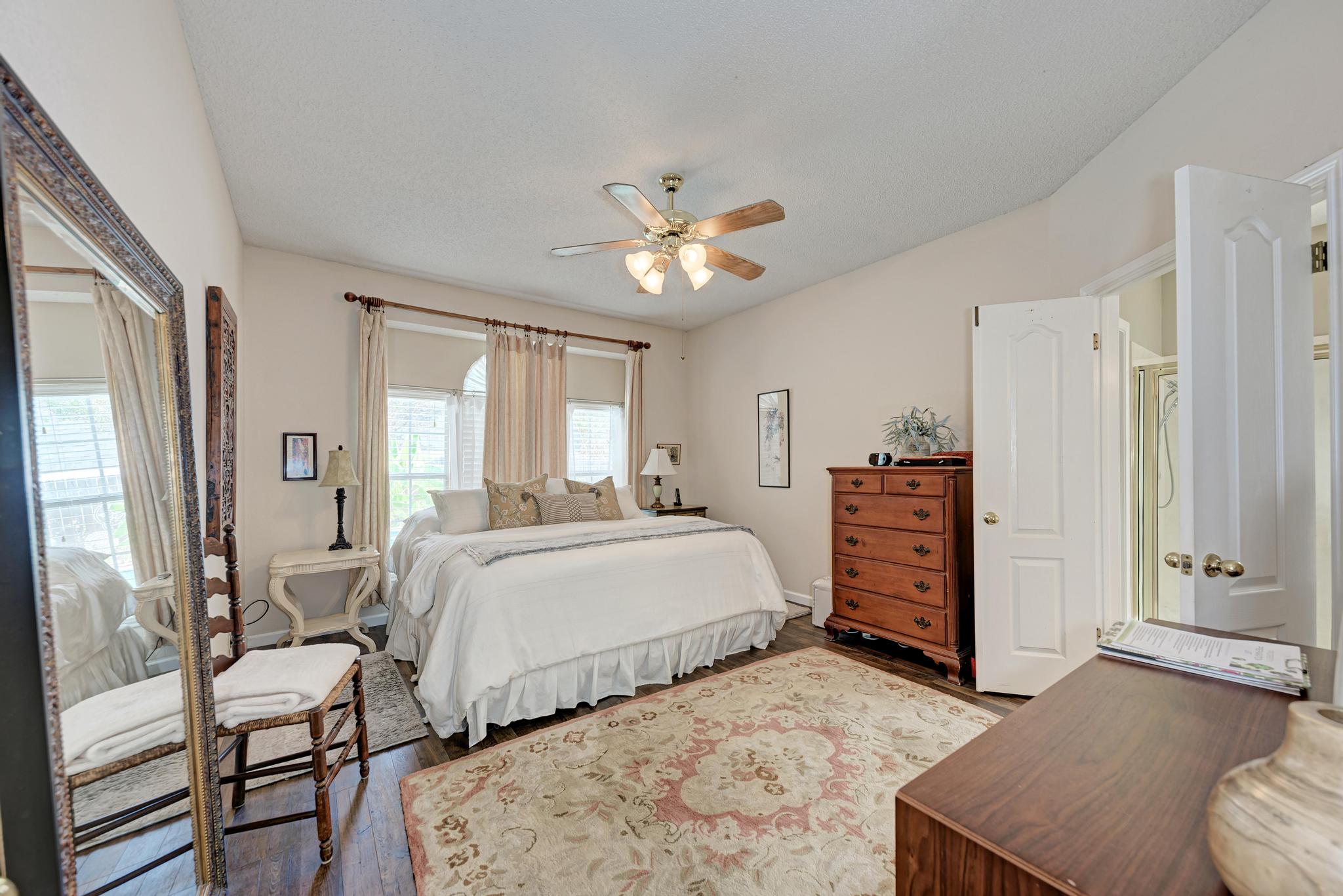 404 Cripple Creek Road Cedar Park, TX 78613 - Photo 23 of 39 a bedroom with bed and window