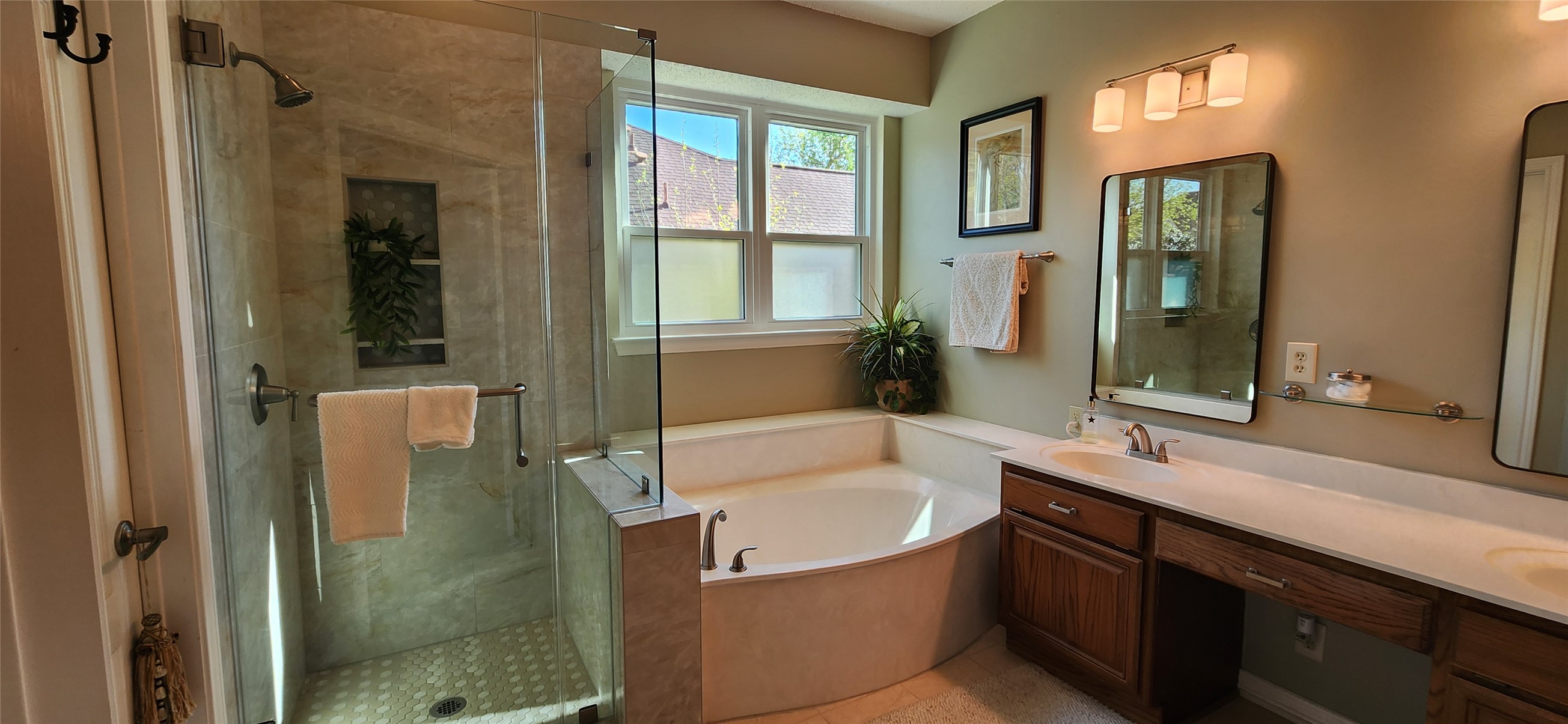 404 Cripple Creek Road Cedar Park, TX 78613 - Photo 26 of 39 Full bathroom with a stall shower, double vanity, and a garden tub