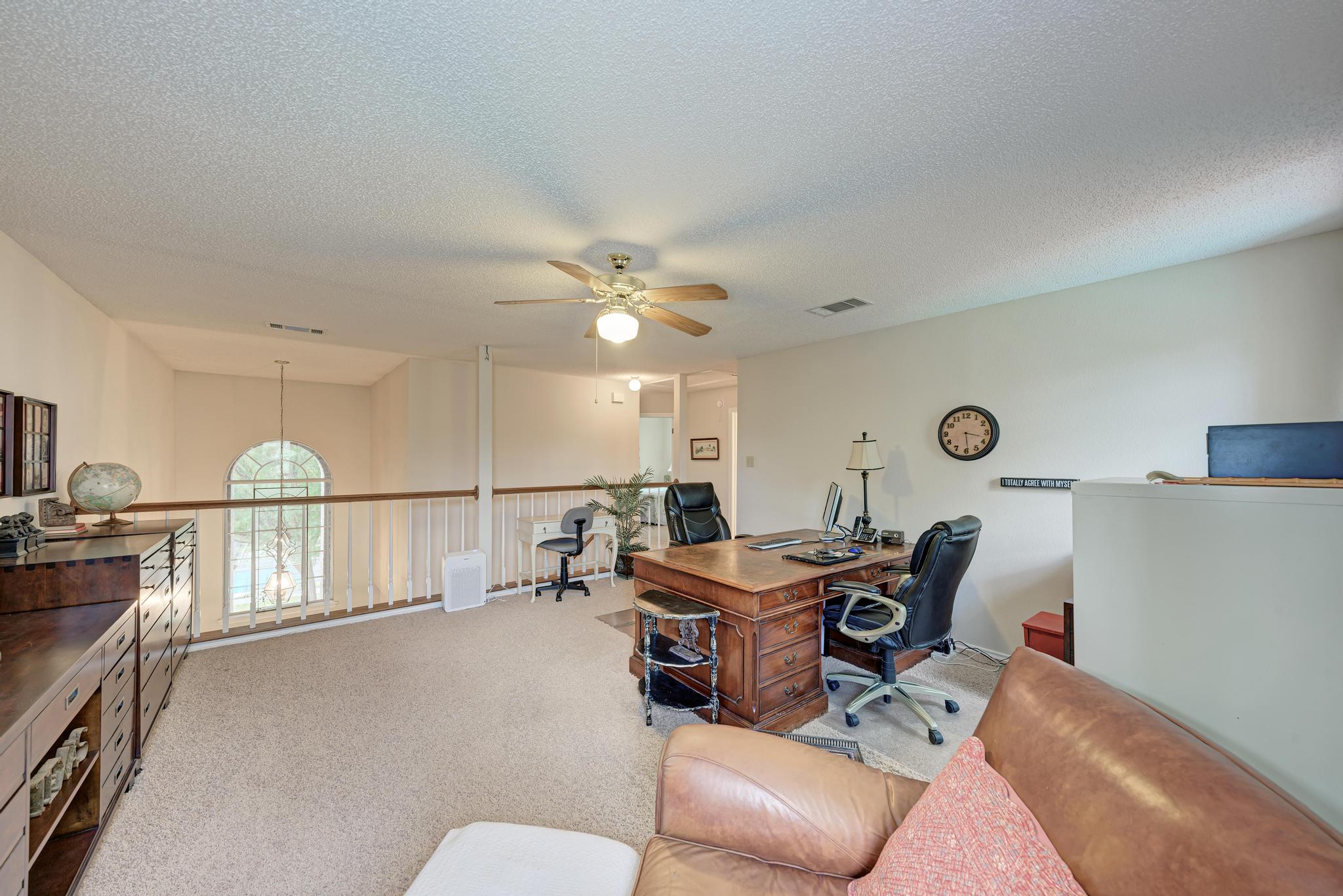 404 Cripple Creek Road Cedar Park, TX 78613 - Photo 29 of 39 Carpeted office space with ceiling fan and a textured ceiling