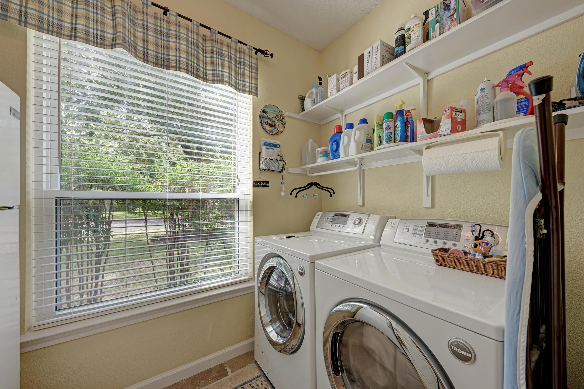 404 Cripple Creek Road Cedar Park, TX 78613 - Photo 32 of 39 a utility room with dryer and washer