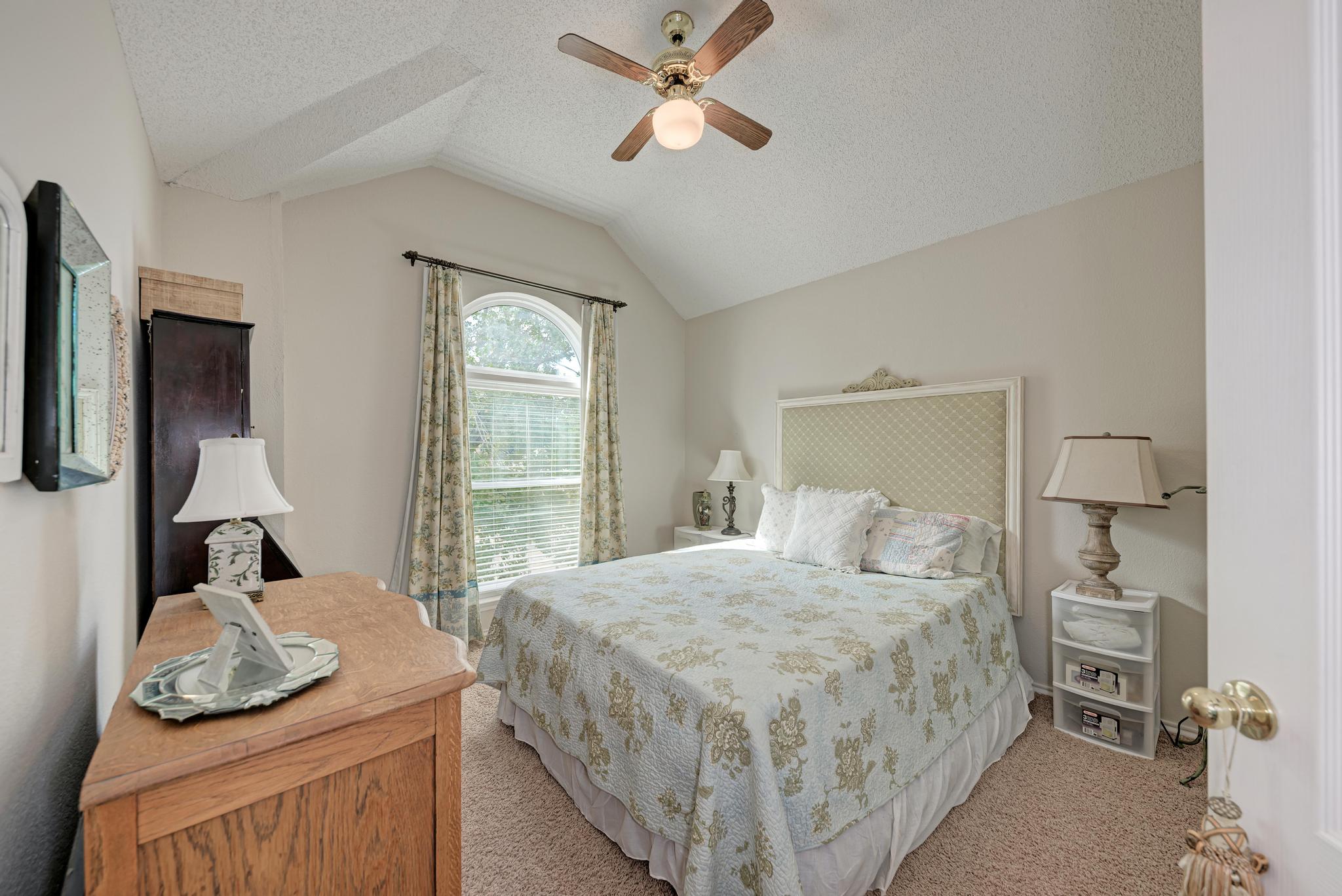 404 Cripple Creek Road Cedar Park, TX 78613 - Photo 33 of 39 a bedroom with a bed and window