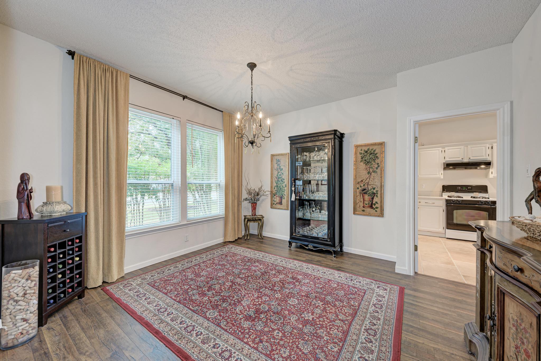404 Cripple Creek Road Cedar Park, TX 78613 - Photo 9 of 39 a living room with furniture and a rug