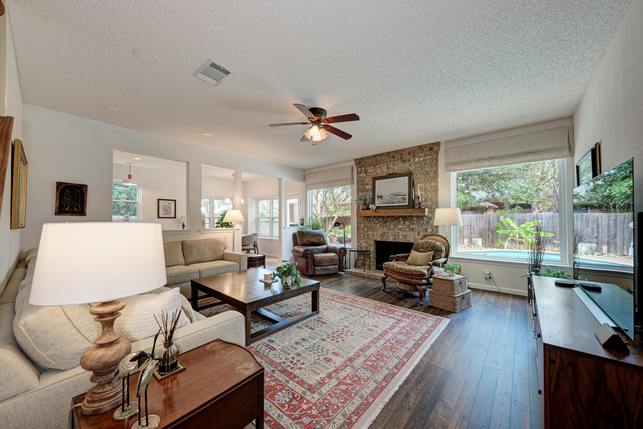 404 Cripple Creek Road Cedar Park, TX 78613 - Photo 10 of 39 a living room with furniture fireplace and flat screen tv