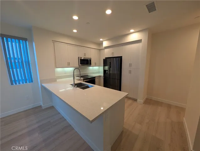 a bathroom with a sink and toilet