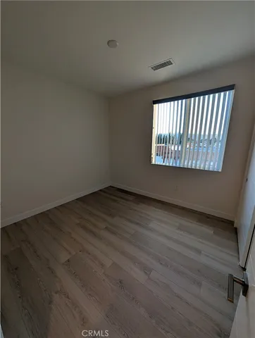 a bathroom with a double vanity sink and mirror