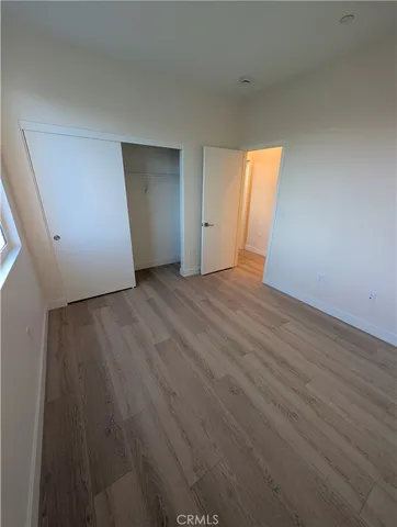 a bathroom with a double vanity sink a mirror and a shower