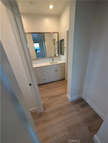 a view of a patio with couches and potted plants