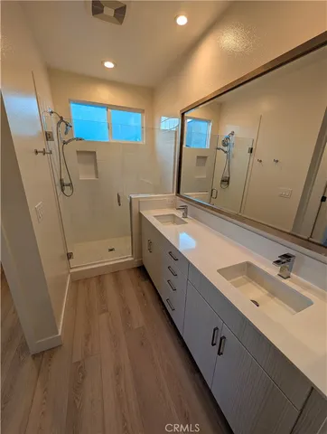 a view of a patio with a table and chairs