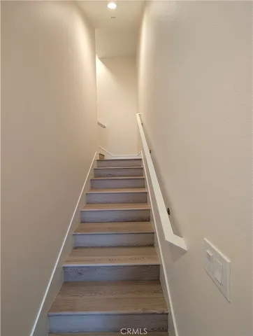 a large kitchen with kitchen island a sink stainless steel appliances and cabinets