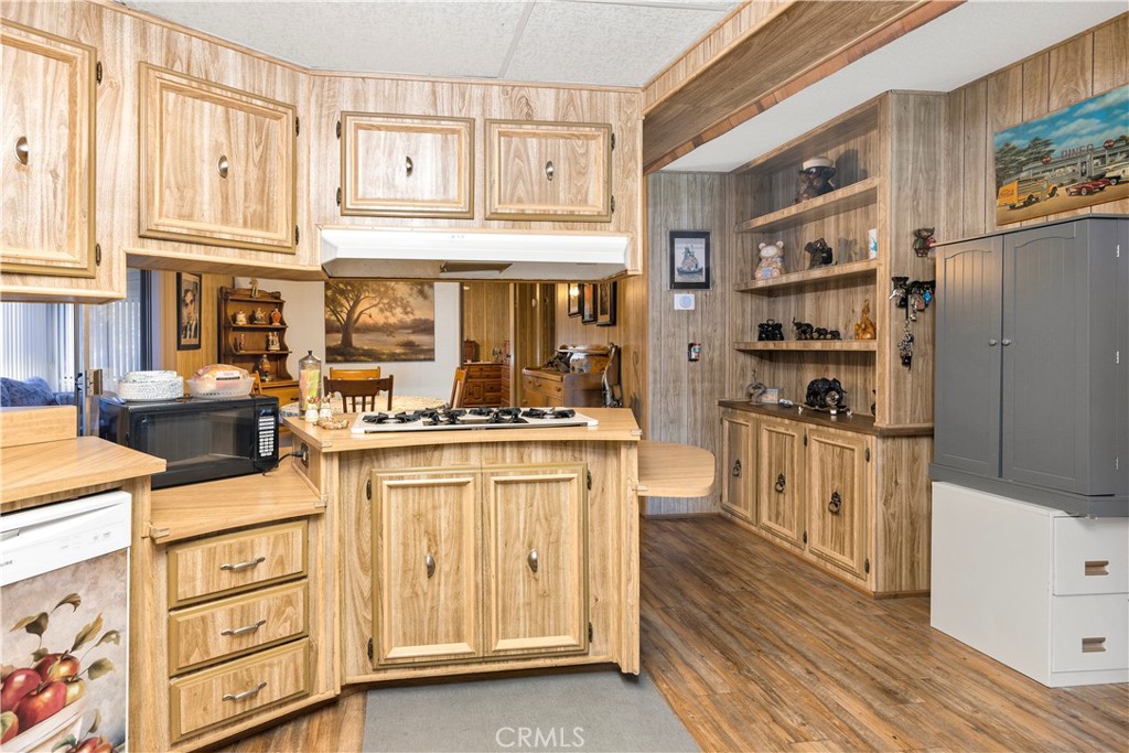 2230 Lake Park Drive, Unit 170 San Jacinto, CA 92583 - Photo 14 of 40 a kitchen with stainless steel appliances granite countertop a sink and cabinets