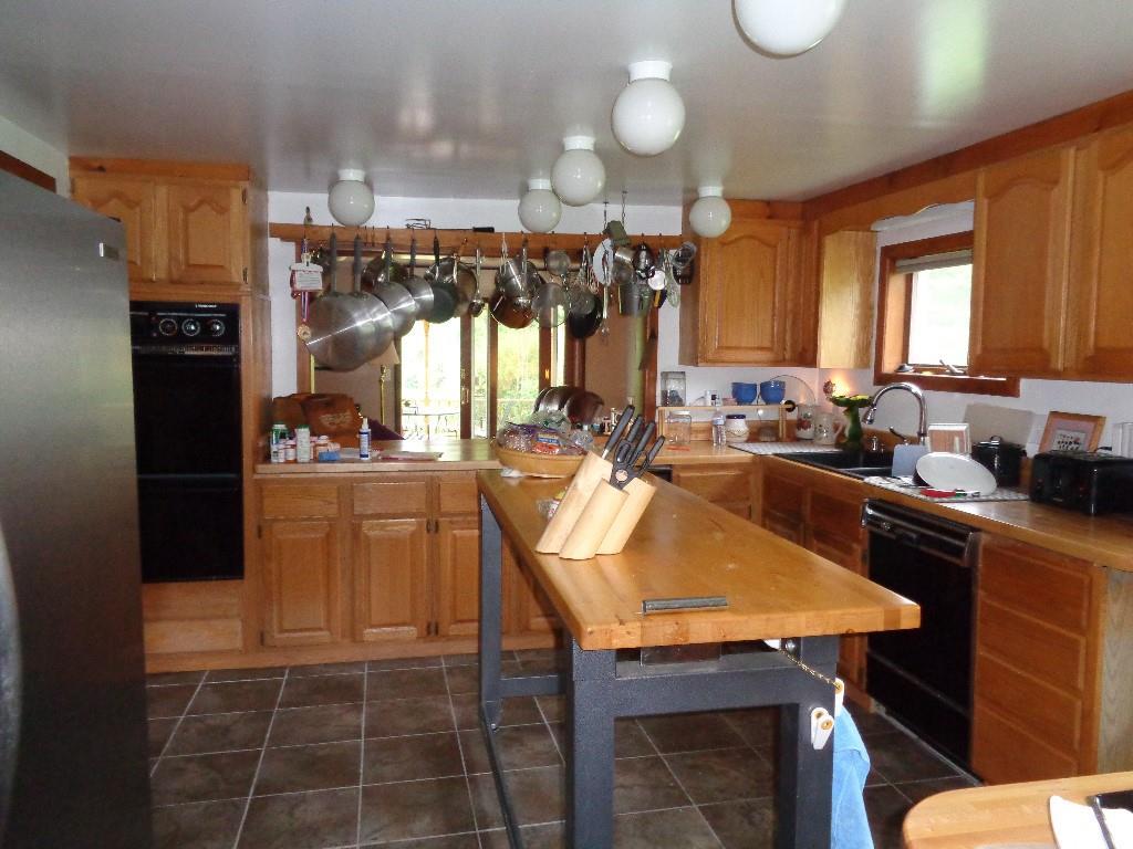 135 Burrill Hill Road Norridgewock, ME 04957 - Photo 2 of 32 Custom kitchen with butcher block...