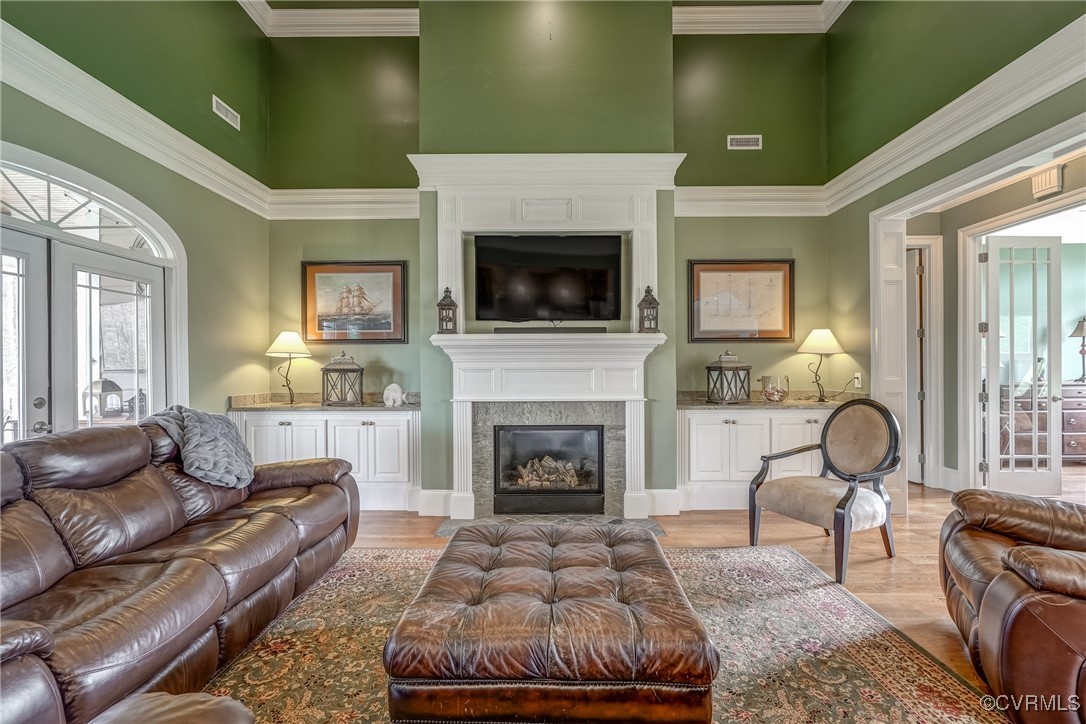 7266 Osprey Drive Lanexa, VA 23089 - Photo 11 of 35 Living room featuring french doors, crown molding,