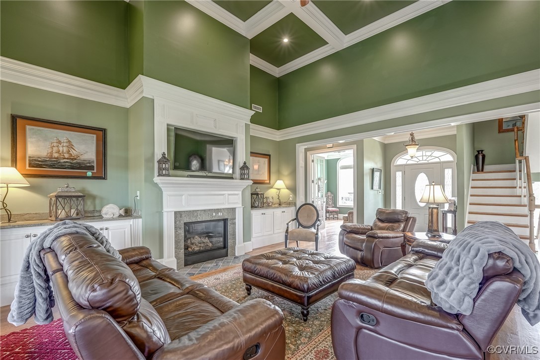 7266 Osprey Drive Lanexa, VA 23089 - Photo 12 of 35 Living room with beamed ceiling, a towering ceilin