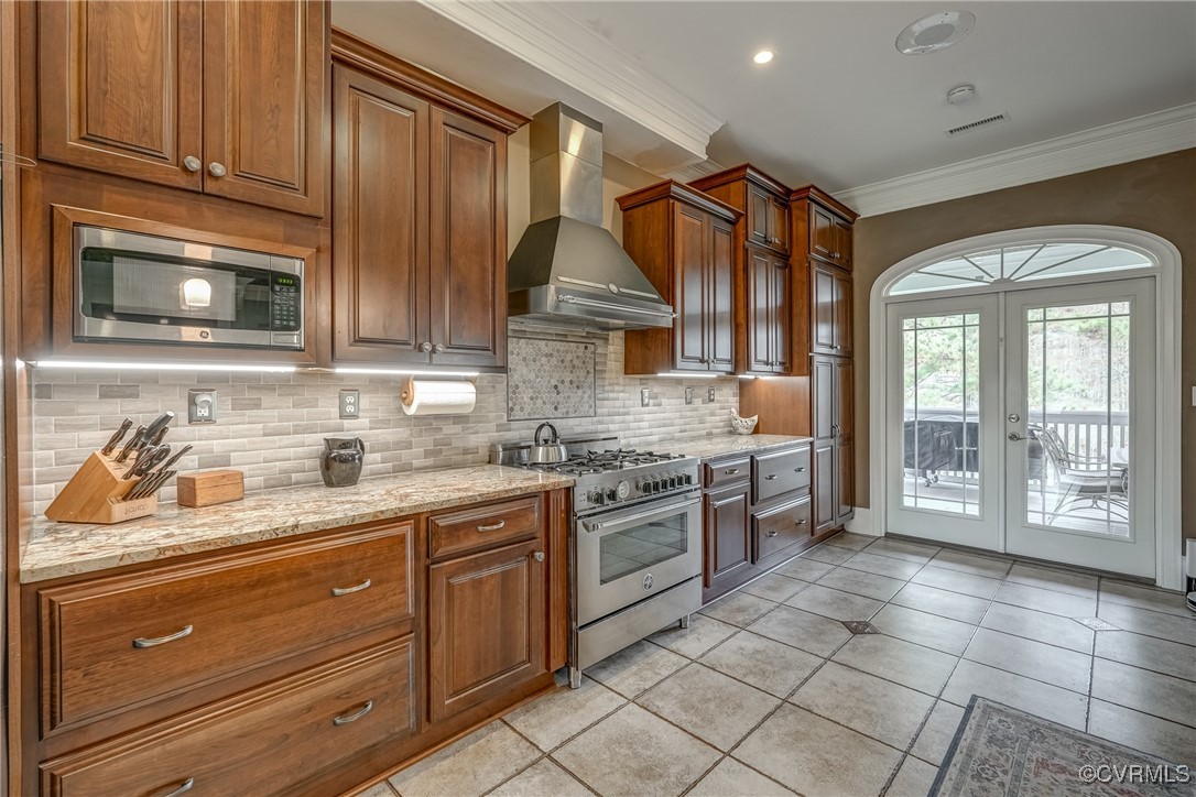 7266 Osprey Drive Lanexa, VA 23089 - Photo 15 of 35 Kitchen with french doors, wall chimney exhaust ho
