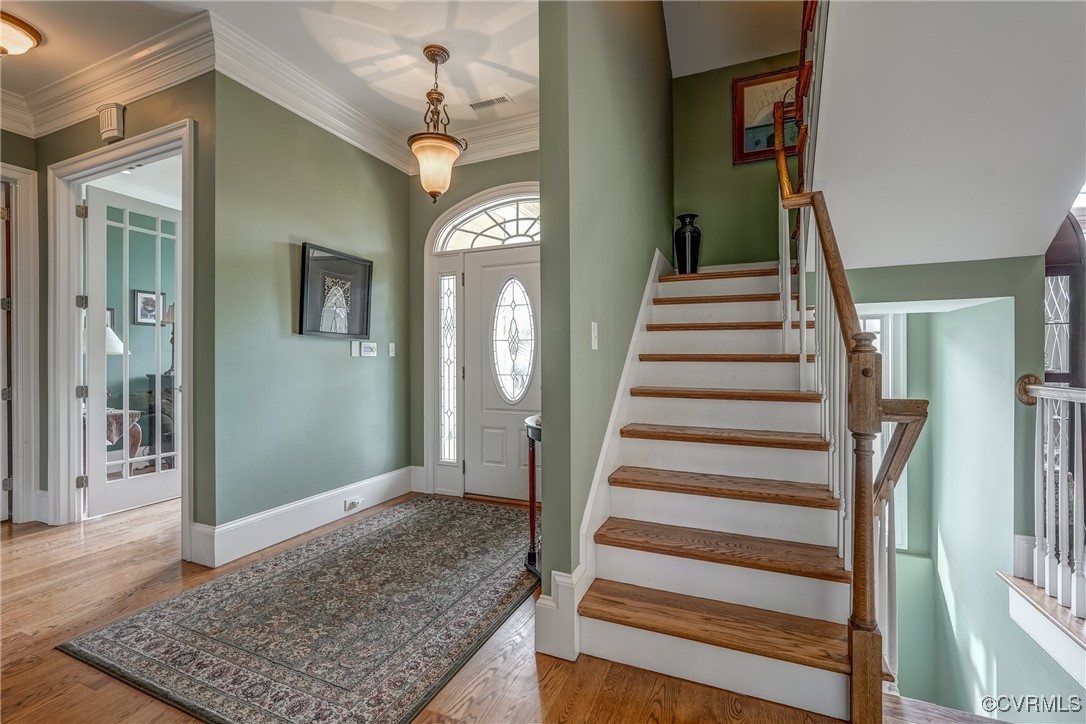 7266 Osprey Drive Lanexa, VA 23089 - Photo 7 of 35 Foyer entrance with ornamental molding and light w
