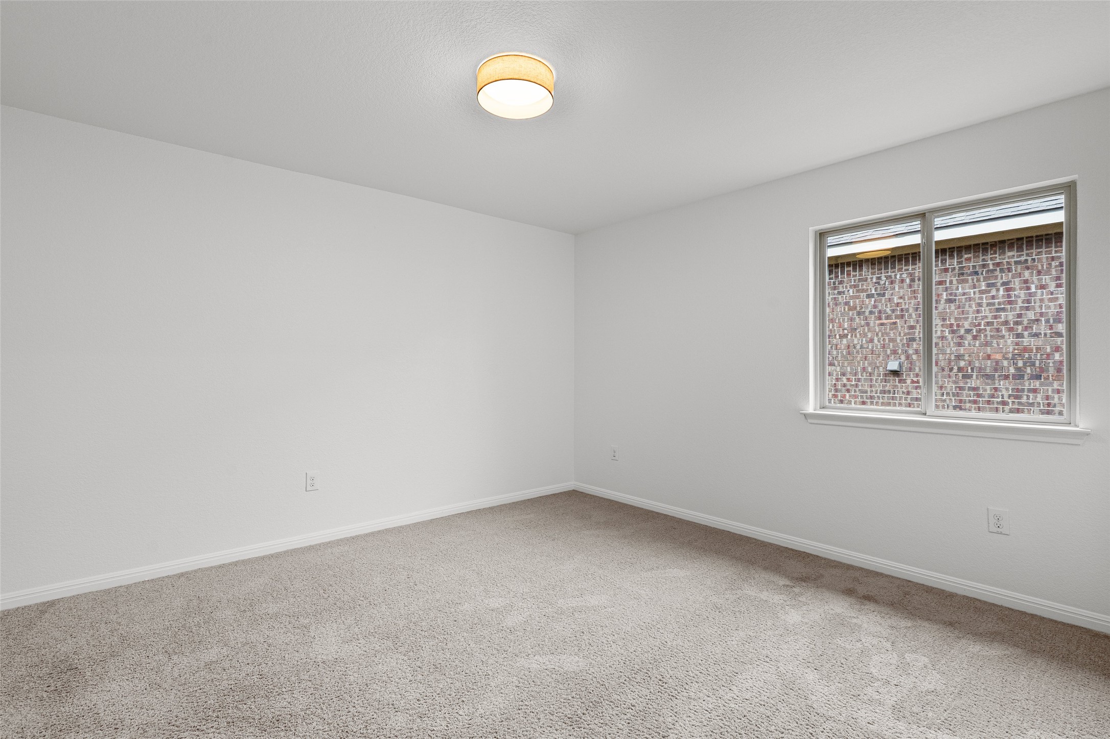 705 Schefer Street Leander, TX 78641 - Photo 22 of 26 an empty room with a window