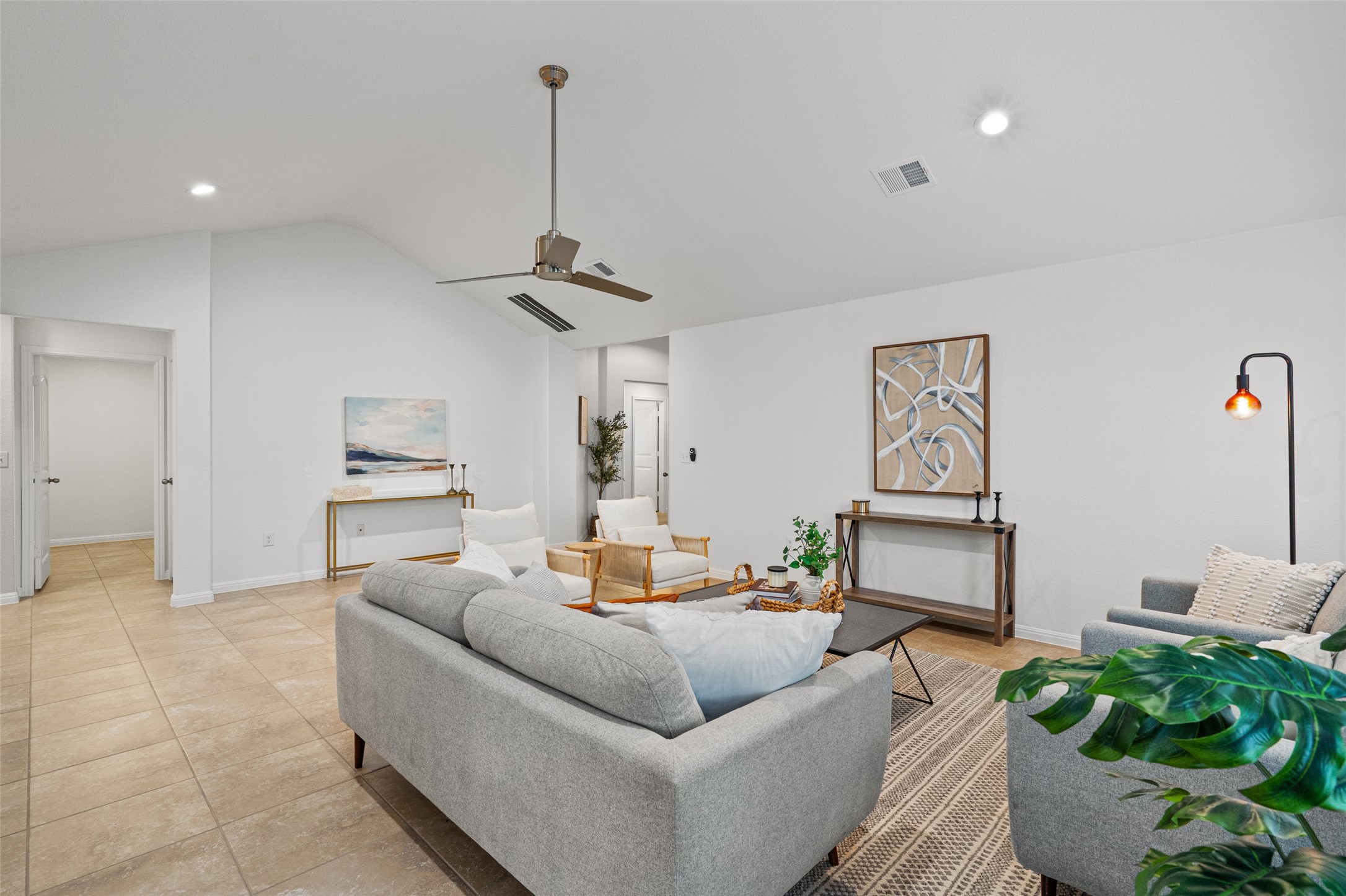 705 Schefer Street Leander, TX 78641 - Photo 6 of 26 a living room with furniture and a wooden floor